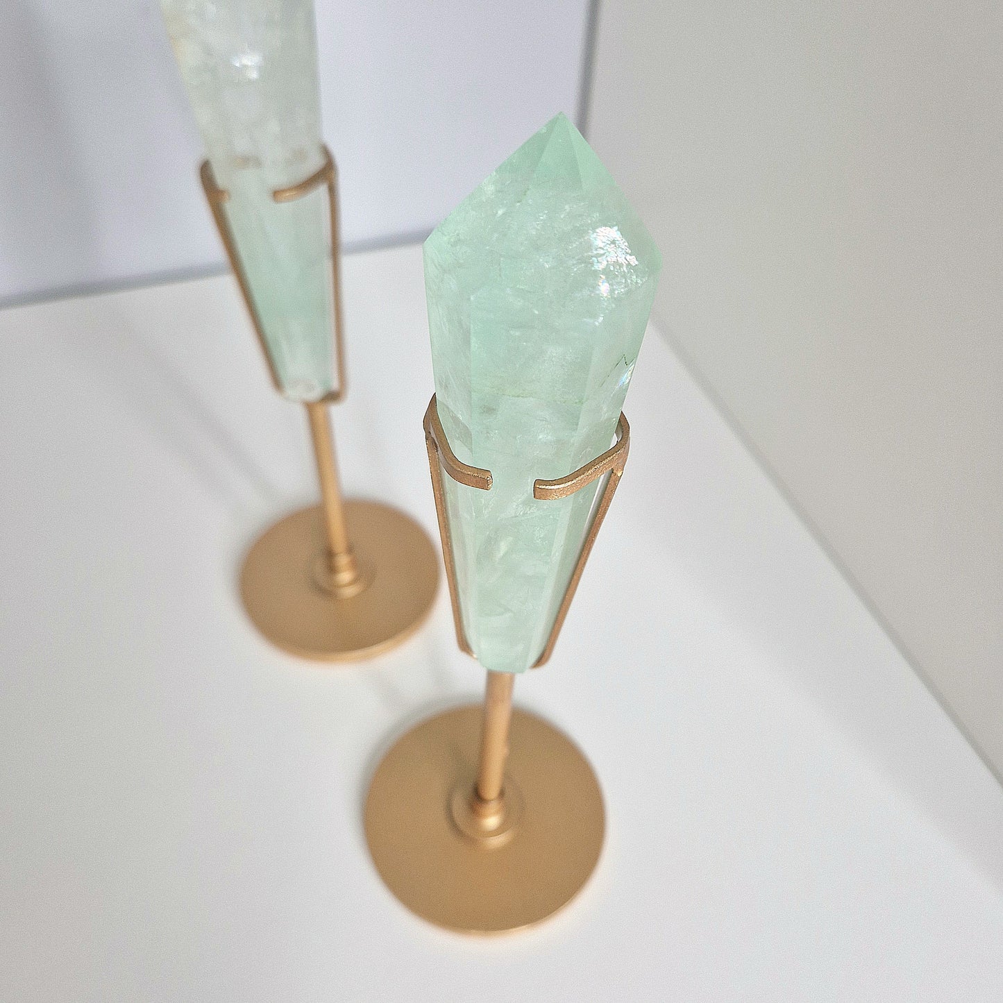 Groene Fluoriet punt op houder