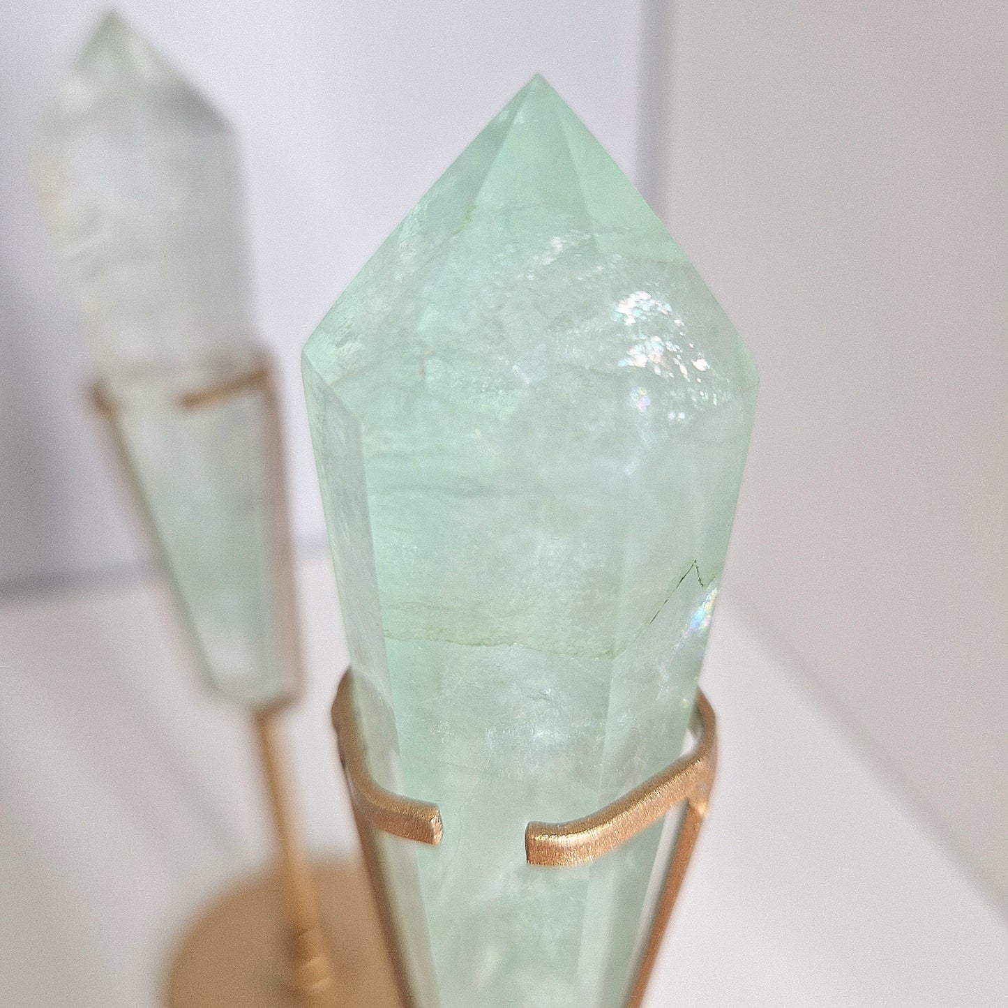 Green Fluorite point on holder